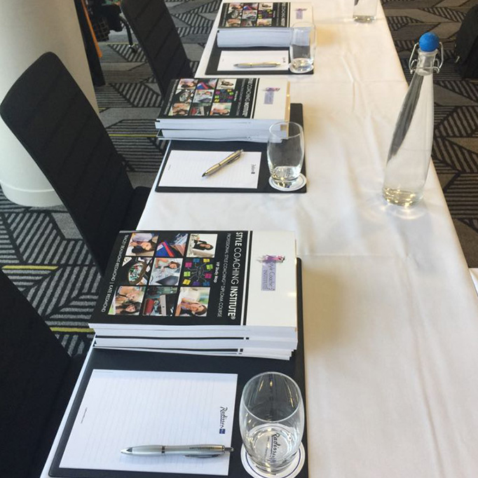 A image of a table with the style coaching institute training guide